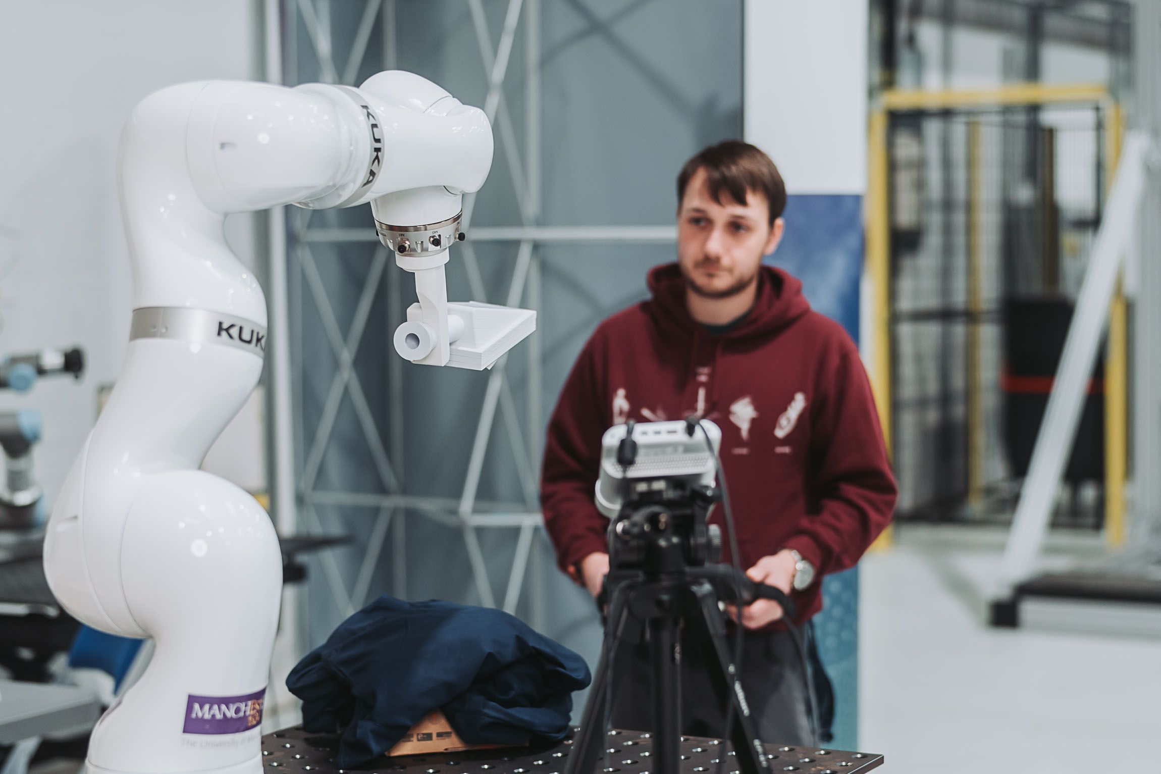 RAICo fellow working on robot